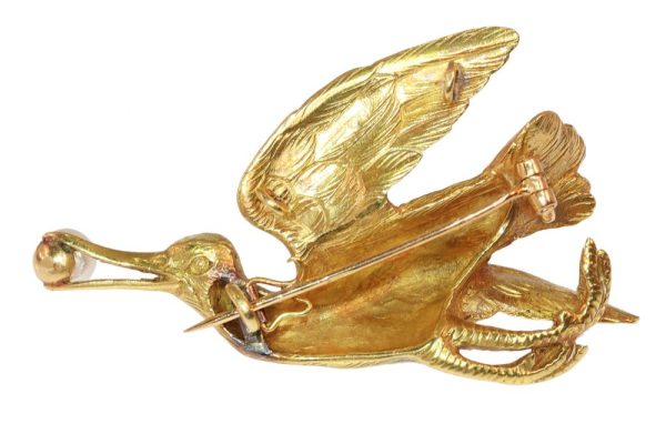 Victorian stork brooch/pendant in gold.