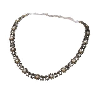 Antique diamond and pearl choker in gold and silver.
