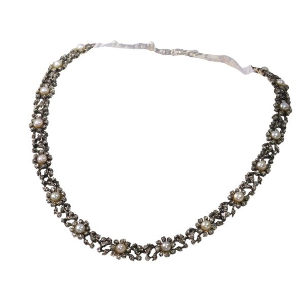 Antique diamond and pearl choker in gold and silver.