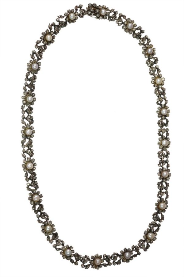 Antique diamond and pearl choker in gold and silver.