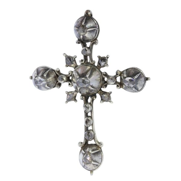Rococo silver cross diamond set pendant.
