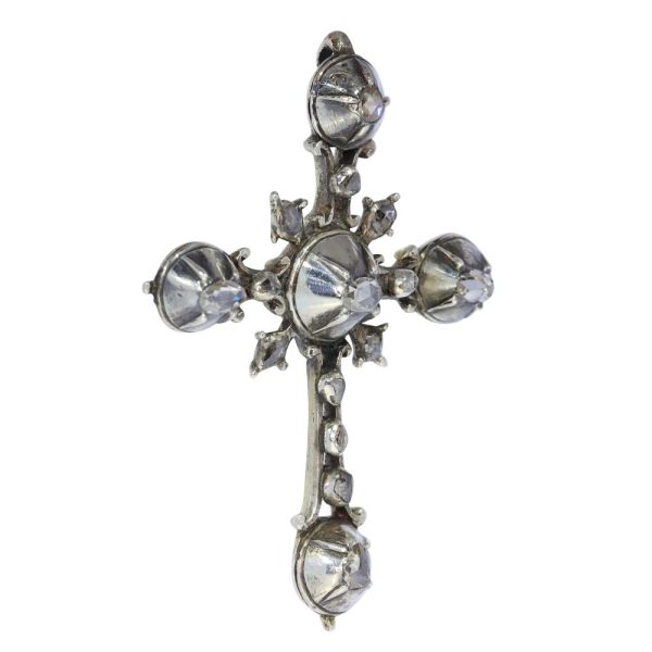 Rococo silver cross diamond set pendant.