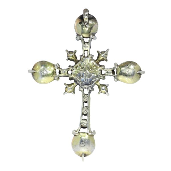 Rococo silver cross diamond set pendant.