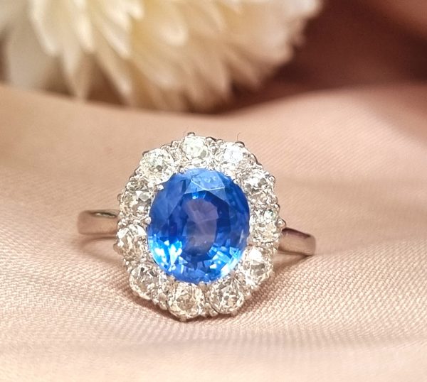 Vintage Sapphire and diamond cluster engagement ring