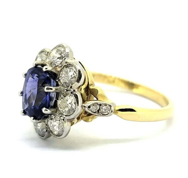 sapphire and diamond cluster ring yellow gold oval shape