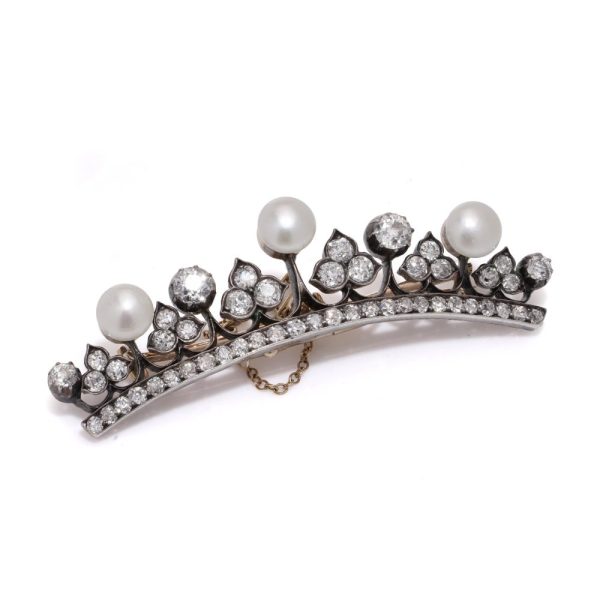 Diamond and pearl tiara brooch in rose gold and silver.
