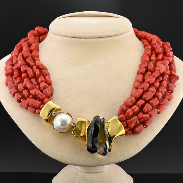 Misani Milano Natural Red Sardinia Coral Necklace, 6 intertwined strands of natural Italian Red Sardinia coral with 18ct yellow gold clasp set with diamonds, mabe pearl, black onyx and rock crystal, Circa 1980
