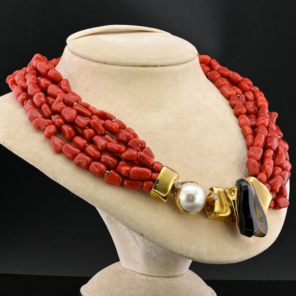 Misani Milano Natural Red Sardinia Coral Necklace, 6 intertwined strands of natural Italian Red Sardinia coral with 18ct yellow gold clasp set with diamonds, mabe pearl, black onyx and rock crystal, Circa 1980