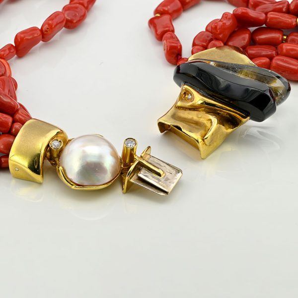Misani Milano Natural Red Sardinia Coral Necklace with 18ct yellow gold clasp set with diamonds, mabe pearl, black onyx and rock crystal, Circa 1980