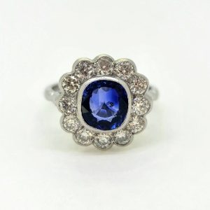 2.25ct Oval Sapphire and Diamond Floral Cluster Ring in Platinum