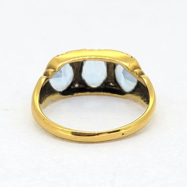 Aquamarine Three Stone Ring in 18ct Yellow Gold with Diamond Accents