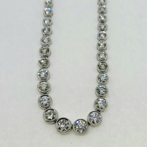 Graduated 12.84ct Diamond Collar Line Necklace, 12.84 carats of round brilliant-cut diamonds individually rubover set and mounted in 18ct white gold