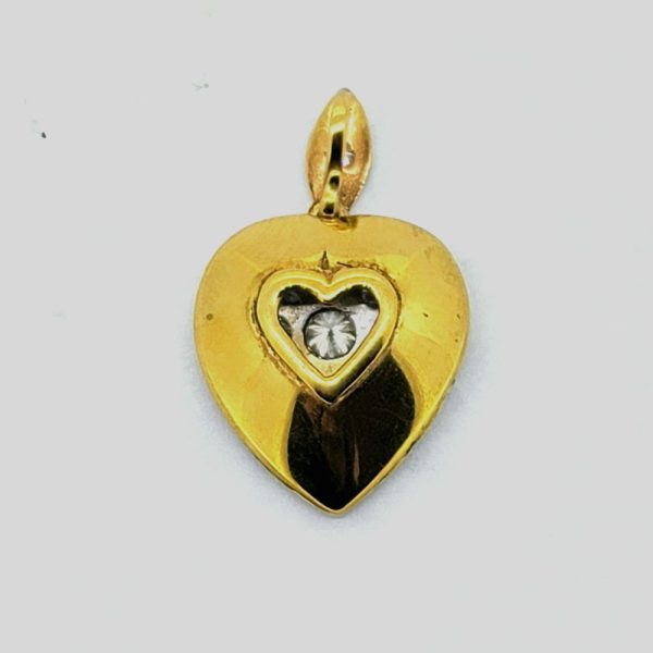 2ct Diamond Heart Shaped Pendant, set with 2 carats of sparkling diamond in silver to a 9ct yellow gold back with pierced heart to reverse