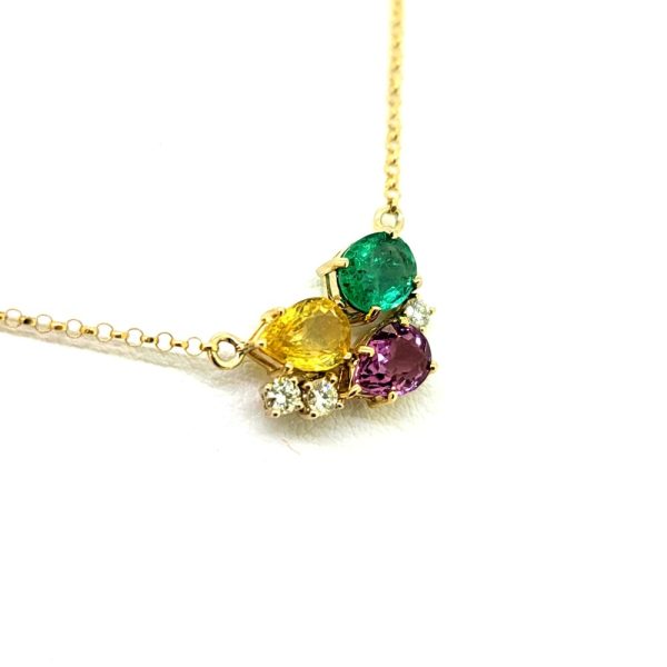 Multi Gemstone and Diamond Pendant with Chain, pear cut 0.77ct yellow sapphire and 0.50ct pink tourmaline with 0.64ct oval-cut emerald with brilliant-cut diamond accents in 18ct yellow gold on fixed yellow gold trace chain