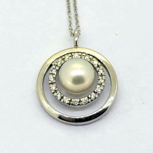 Contemporary Circular Pearl and Diamond Pendant
