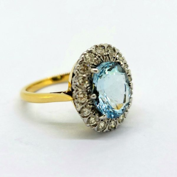 3.50ct Aquamarine and Diamond Oval Cluster Engagement Ring in 18ct Yellow Gold