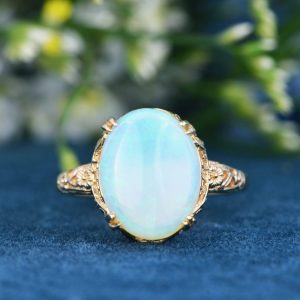 Opal Solitaire Statement Ring in Filigree Yellow Gold