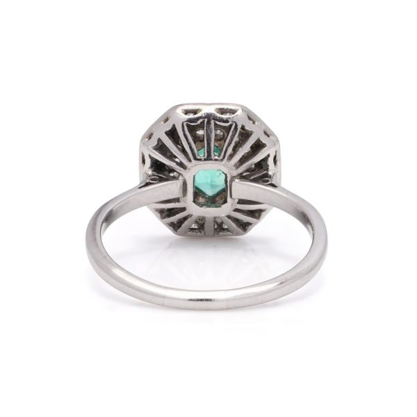 Diamond and emerald ring in platinum.