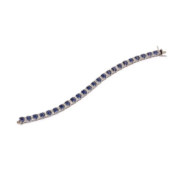 Sapphire and diamond link bracelet in white gold.