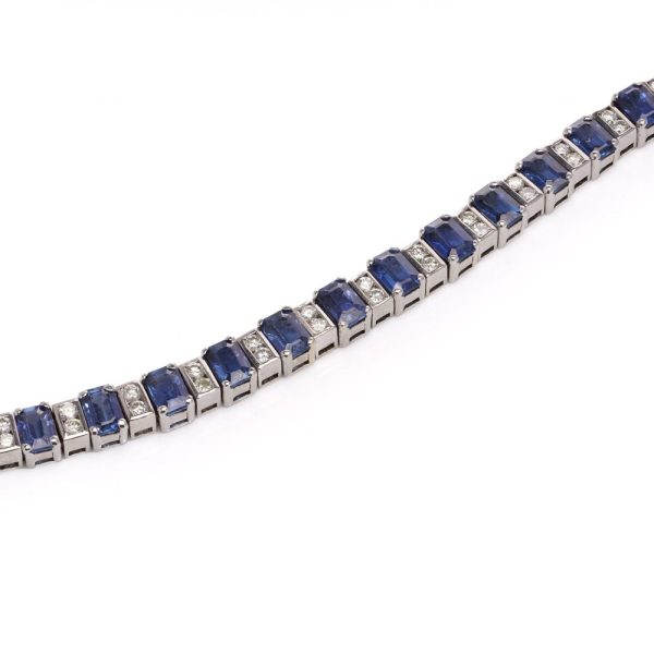 Sapphire and diamond link bracelet in white gold.