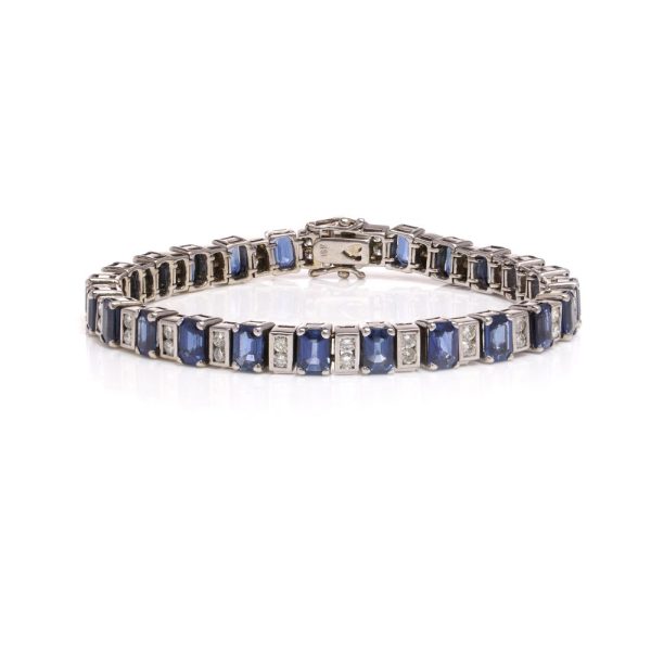 Sapphire and diamond link bracelet in white gold.