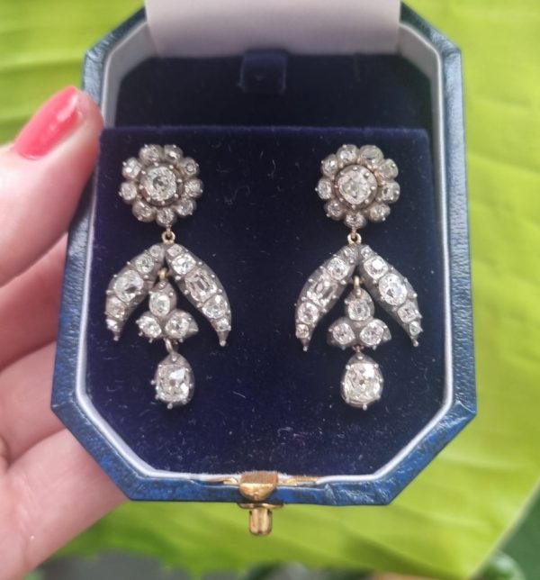 Antique Georgian Diamond Drop Earrings, Circa 1820 A pair of Georgian diamond drop earrings, each earring has been set with  mixture of early old mine cut and table cut diamonds in silver cut down settings. Circa 1820