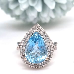 6.04ct Pear Cut Aquamarine and Diamond Cluster Ring