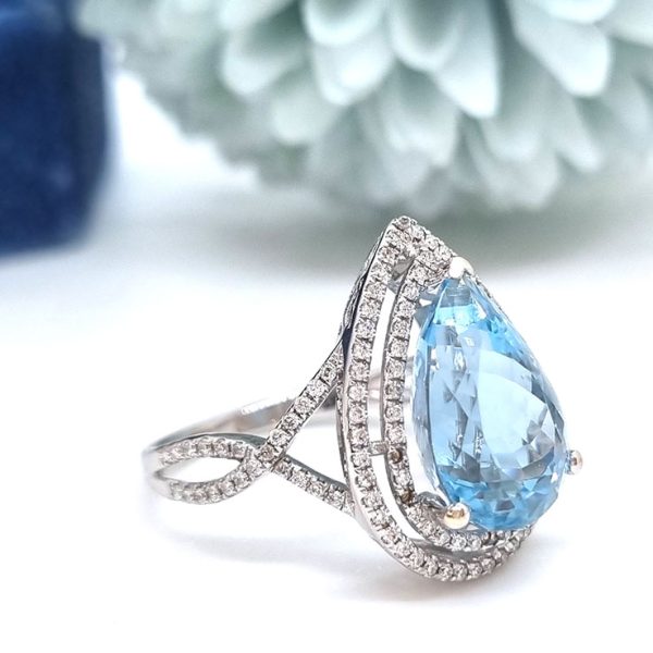 6.04ct Pear Cut Brazilian Aquamarine and Double Diamond Cluster Ring