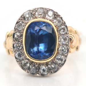 Antique 2.75ct Cushion Cut Sapphire and Diamond Cluster Ring, oval cushion-cut sapphire surrounded by 0.70cts old-cut diamonds in 18ct yellow gold