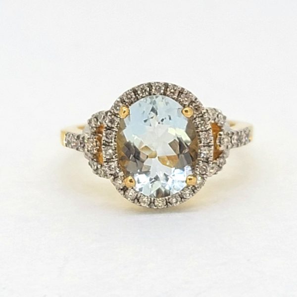 2.30ct Oval Aquamarine and Diamond Cluster Engagement Ring in 18cy Yellow Gold