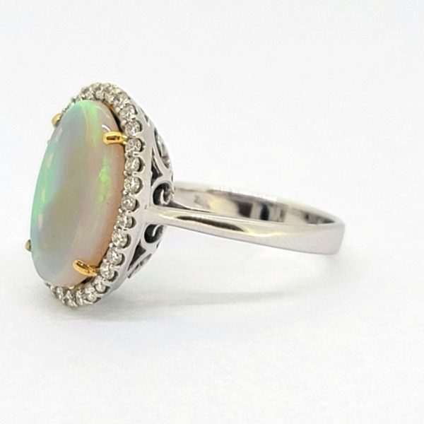 3.68ct Opal and Diamond Halo Cluster Ring