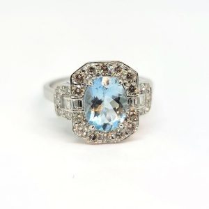 1.50ct Aquamarine and Diamond Cluster Engagement Ring