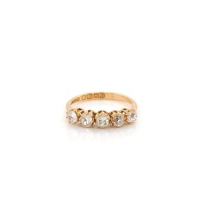 Five stone diamond ring in gold.