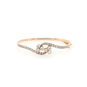 Diamond bangle in silver and gold.