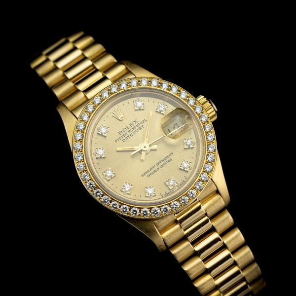 Rolex Lady Datejust 69138 Watch with Factory Set Diamond Bezel, 18ct yellow gold 26mm case champagne dial factory set diamond dot hour markers