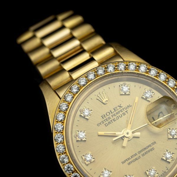 Rolex Lady Datejust 69138 Watch with Factory Set Diamond Bezel, 18ct yellow gold 26mm case champagne dial factory set diamond dot hour markers