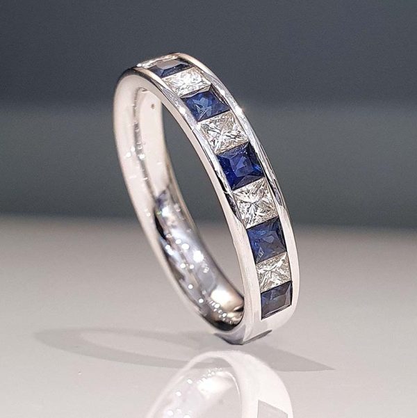 Princess Cut Diamond Sapphire and Diamond Half Eternity Ring, 11 alternating princess-cut diamonds and sapphires in 18ct white gold band