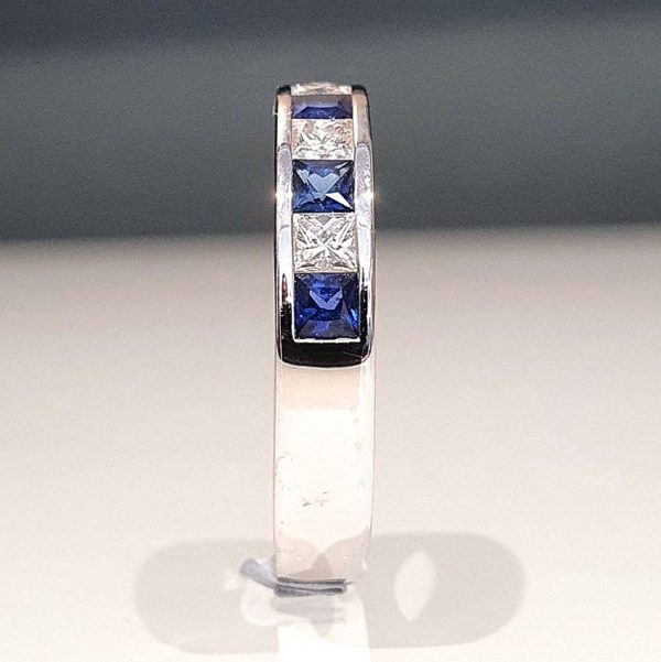 Princess Cut Diamond Sapphire and Diamond Half Eternity Ring, 11 alternating princess-cut diamonds and sapphires in 18ct white gold band