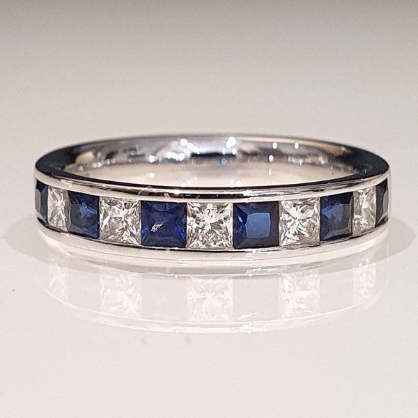 Princess Cut Diamond Sapphire and Diamond Half Eternity Ring, 11 alternating princess-cut diamonds and sapphires in 18ct white gold band