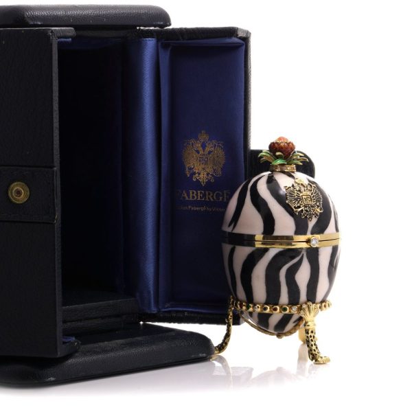 Faberge limited edition gold and enamel egg with gemstones.