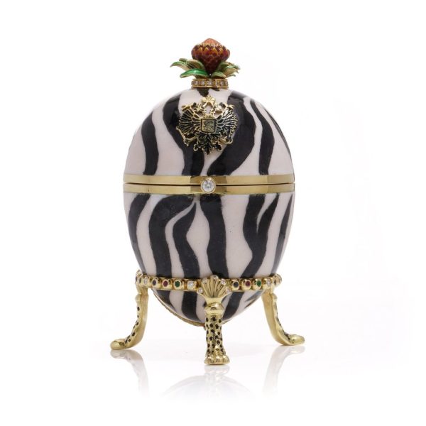 Faberge limited edition gold and enamel egg with gemstones.