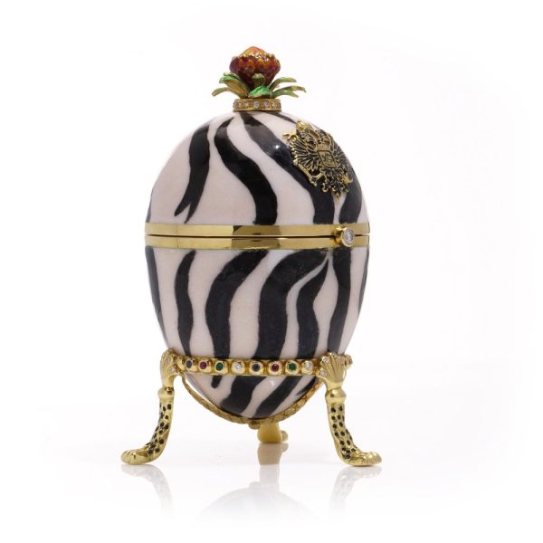 Faberge limited edition gold and enamel egg with gemstones.