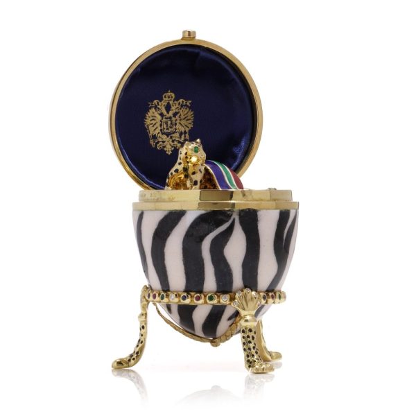 Faberge limited edition gold and enamel egg with gemstones.