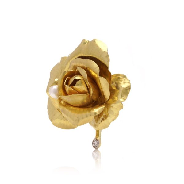 Cartier diamond and pearl rose brooch in gold.