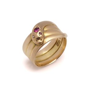 Victorian snake ring with diamond and rubies in gold.