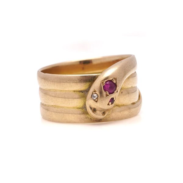 Victorian snake ring with diamond and rubies in gold.