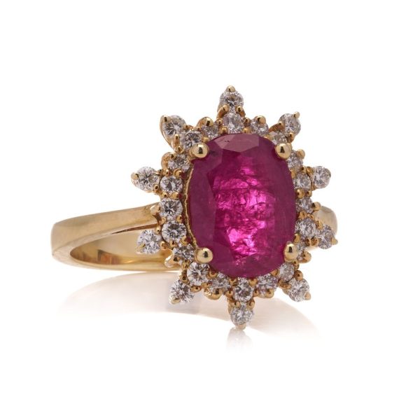 Ruby and diamond cluster ring in yellow gold.