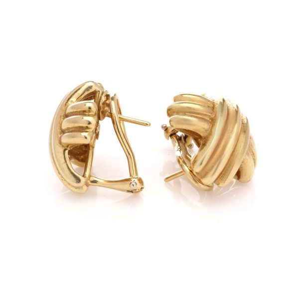 Tiffany & Co. X motif clip-on earrings in gold.