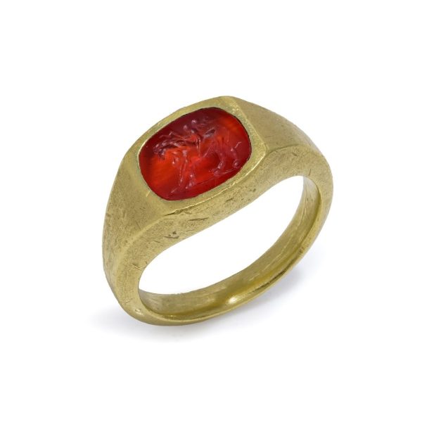 Antique Roman 22ct Gold Carnelian Intaglio Signet Ring, Roman intaglio carved from carnelian depicting Cupid riding a lion Mounted in a 19th century 22ct yellow gold shank