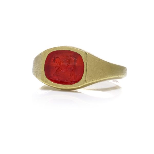 Antique Roman 22ct Gold Carnelian Intaglio Signet Ring, Roman intaglio carved from carnelian depicting Cupid riding a lion Mounted in a 19th century 22ct yellow gold shank